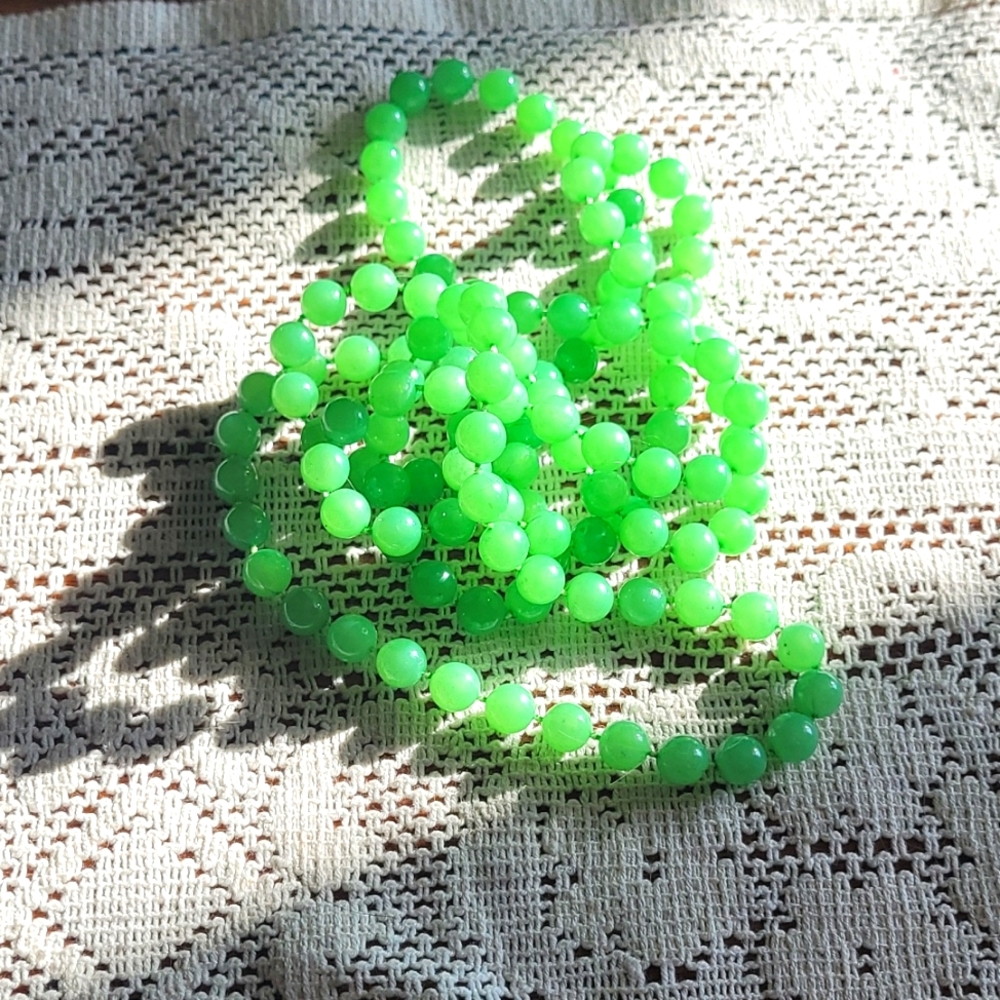Green single strand beaded necklace